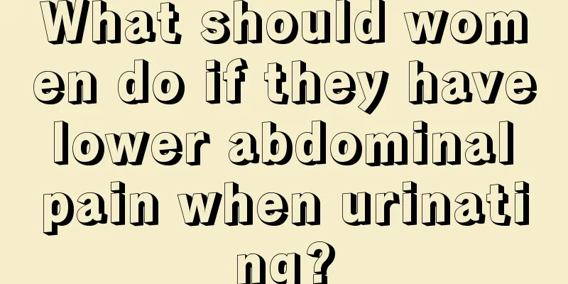 What should women do if they have lower abdominal pain when urinating?