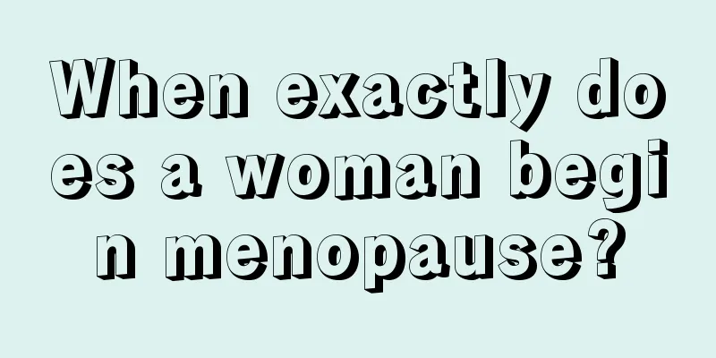 When exactly does a woman begin menopause?