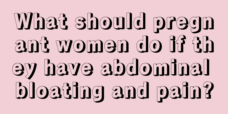 What should pregnant women do if they have abdominal bloating and pain?