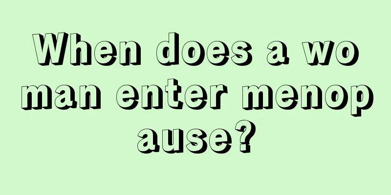 When does a woman enter menopause?