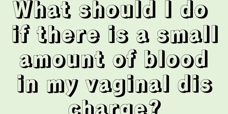 What should I do if there is a small amount of blood in my vaginal discharge?