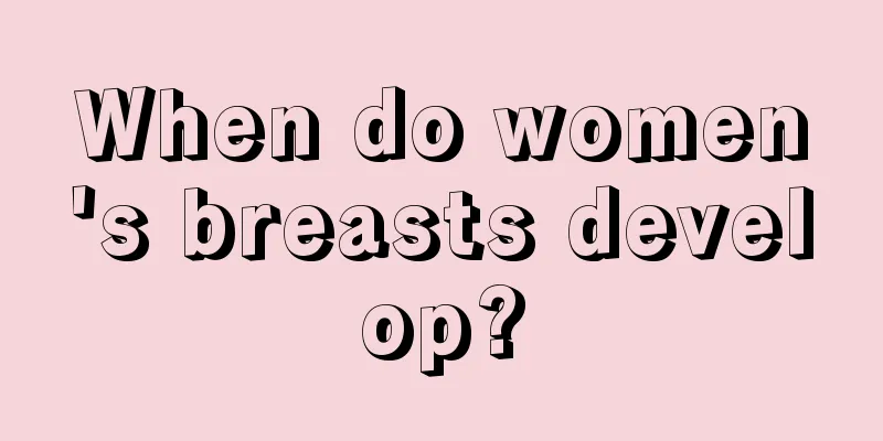 When do women's breasts develop?