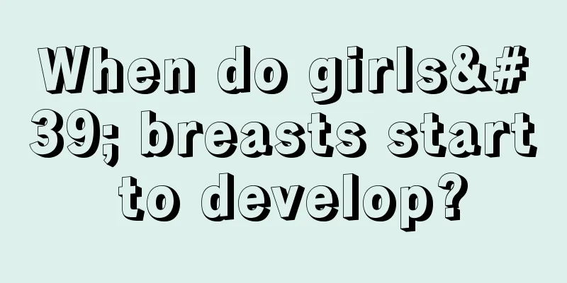 When do girls' breasts start to develop?