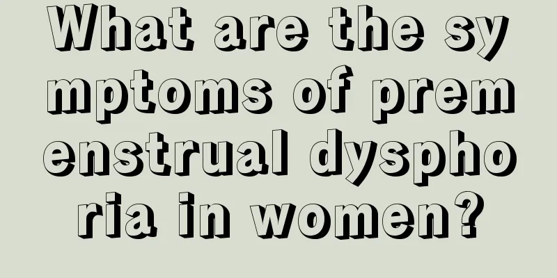 What are the symptoms of premenstrual dysphoria in women?