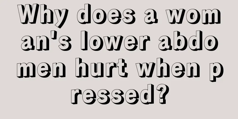 Why does a woman's lower abdomen hurt when pressed?