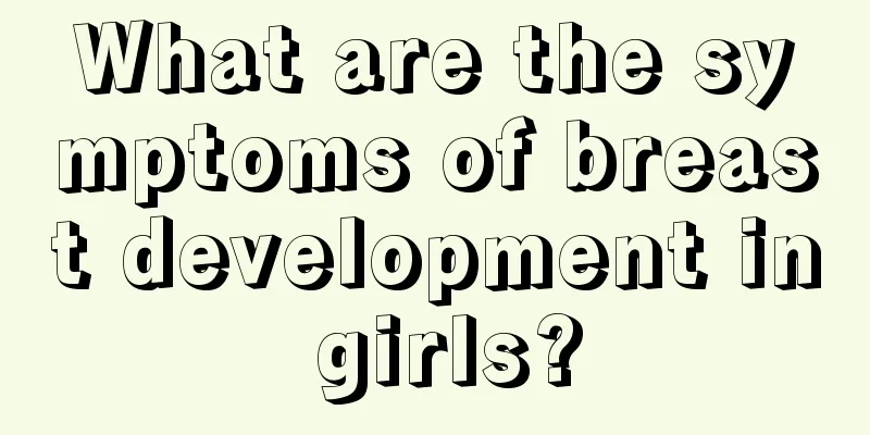 What are the symptoms of breast development in girls?