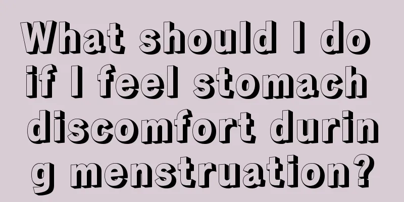 What should I do if I feel stomach discomfort during menstruation?