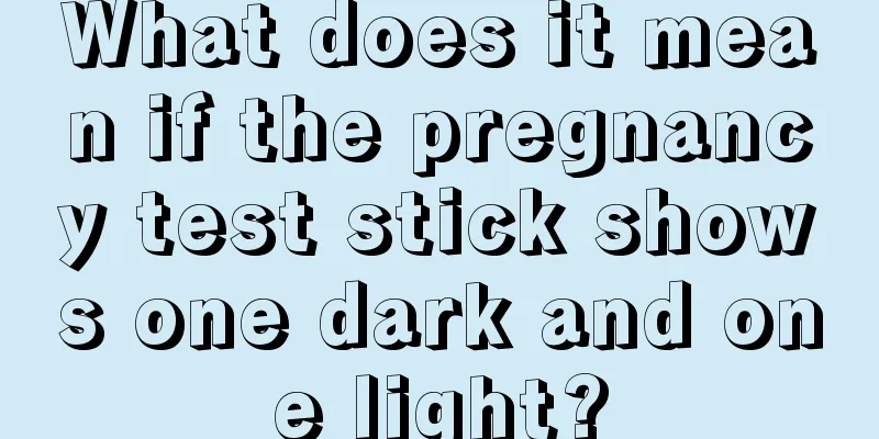 What does it mean if the pregnancy test stick shows one dark and one light?