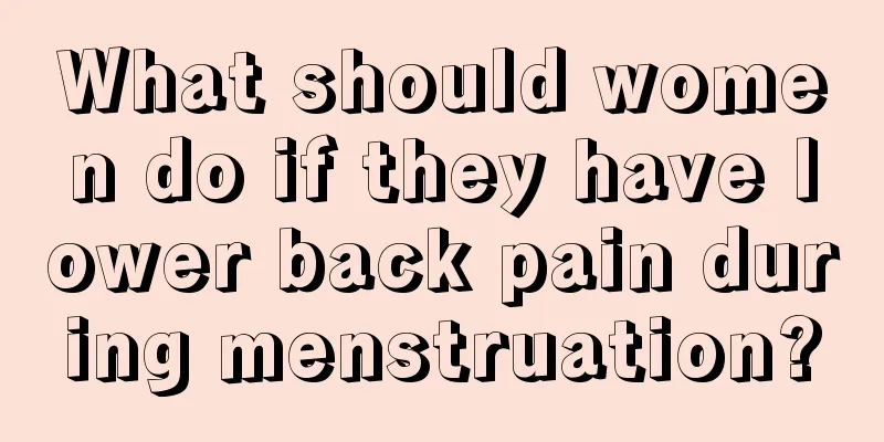 What should women do if they have lower back pain during menstruation?