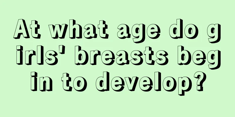 At what age do girls' breasts begin to develop?