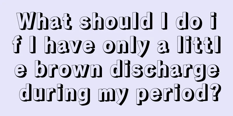 What should I do if I have only a little brown discharge during my period?