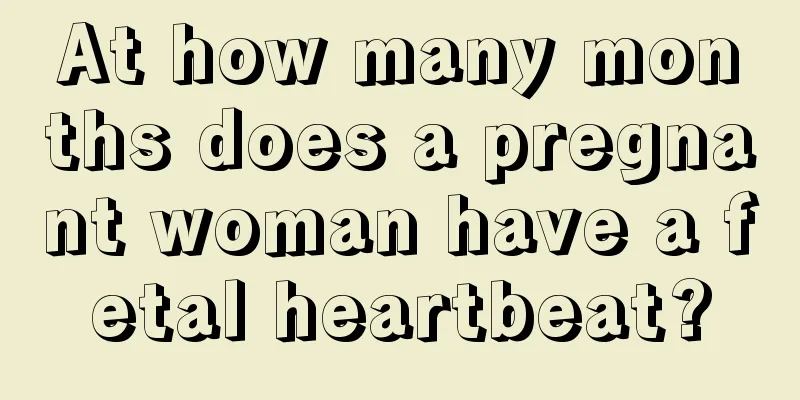 At how many months does a pregnant woman have a fetal heartbeat?