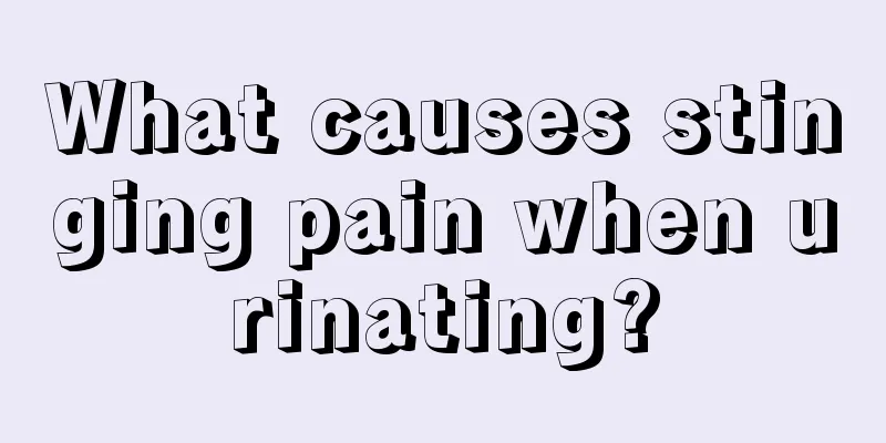 What causes stinging pain when urinating?