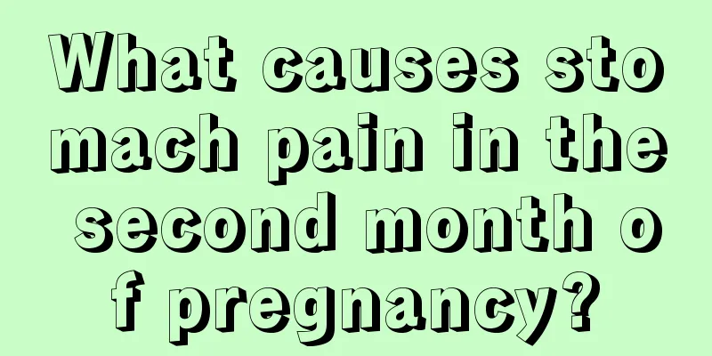 What causes stomach pain in the second month of pregnancy?