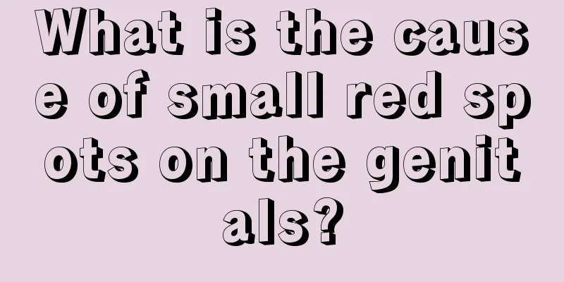 What is the cause of small red spots on the genitals?