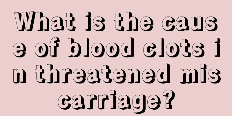 What is the cause of blood clots in threatened miscarriage?