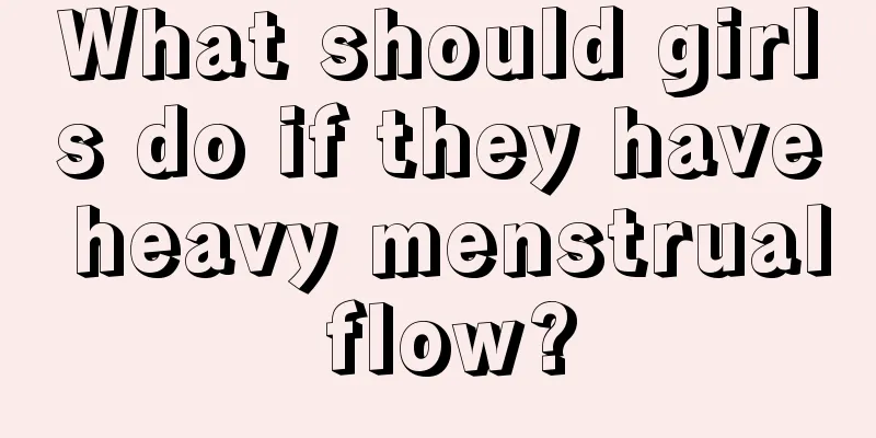 What should girls do if they have heavy menstrual flow?