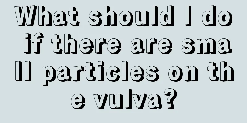 What should I do if there are small particles on the vulva?