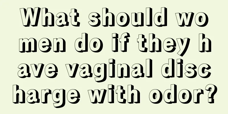 What should women do if they have vaginal discharge with odor?