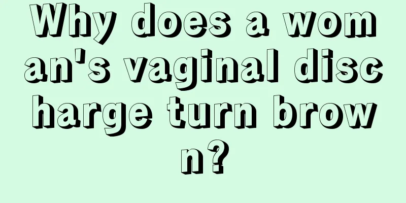 Why does a woman's vaginal discharge turn brown?