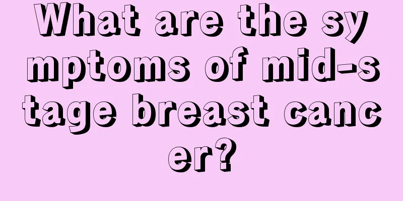 What are the symptoms of mid-stage breast cancer?