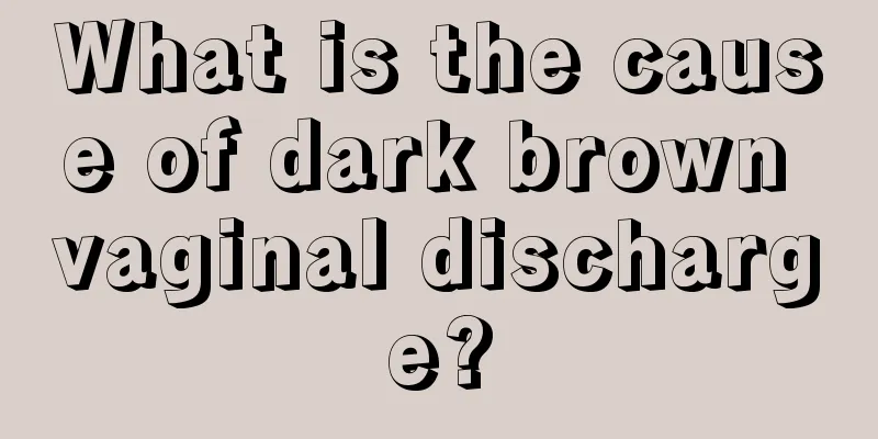 What is the cause of dark brown vaginal discharge?