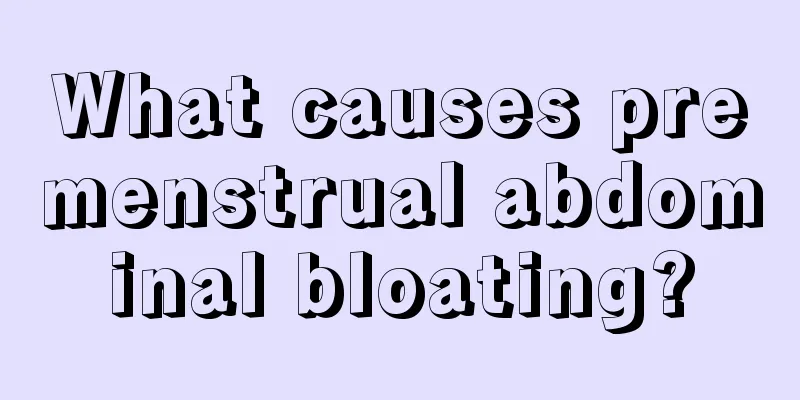 What causes premenstrual abdominal bloating?