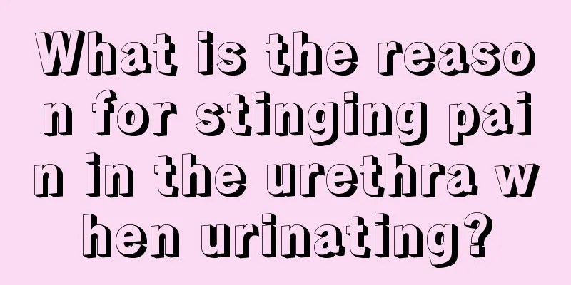 What is the reason for stinging pain in the urethra when urinating?