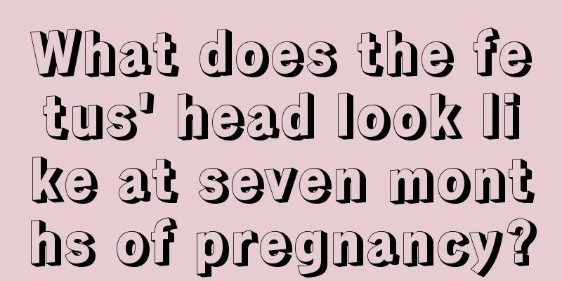 What does the fetus' head look like at seven months of pregnancy?