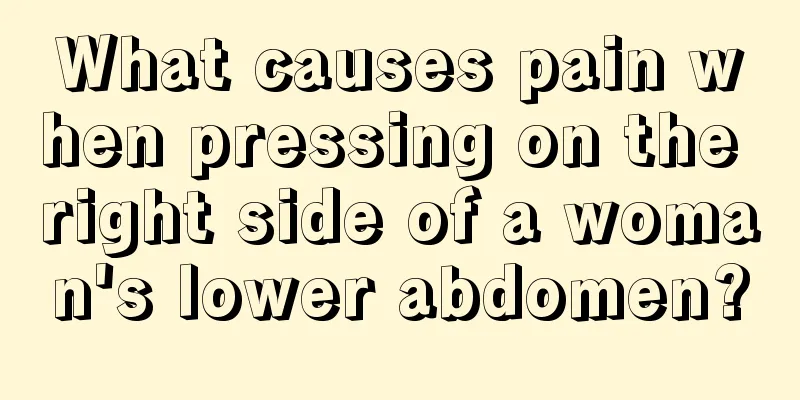 What causes pain when pressing on the right side of a woman's lower abdomen?