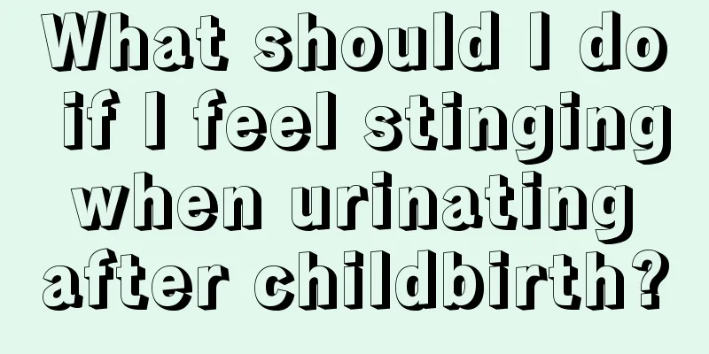 What should I do if I feel stinging when urinating after childbirth?