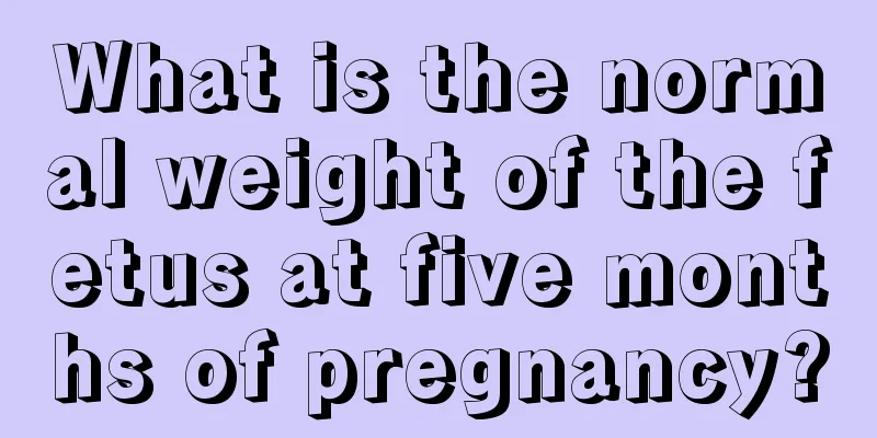 What is the normal weight of the fetus at five months of pregnancy?