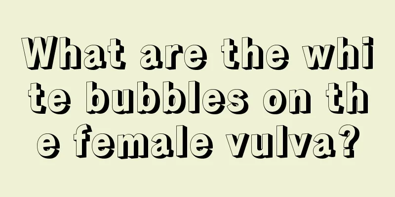 What are the white bubbles on the female vulva?