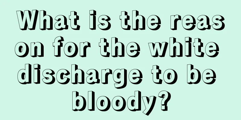 What is the reason for the white discharge to be bloody?