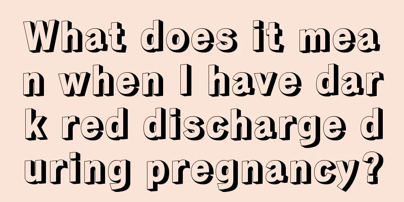 What does it mean when I have dark red discharge during pregnancy?