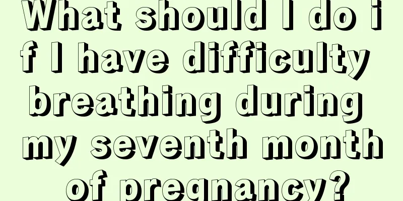 What should I do if I have difficulty breathing during my seventh month of pregnancy?