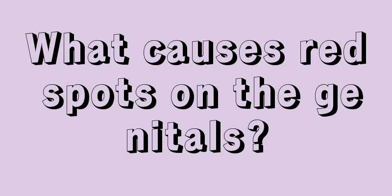 What causes red spots on the genitals?