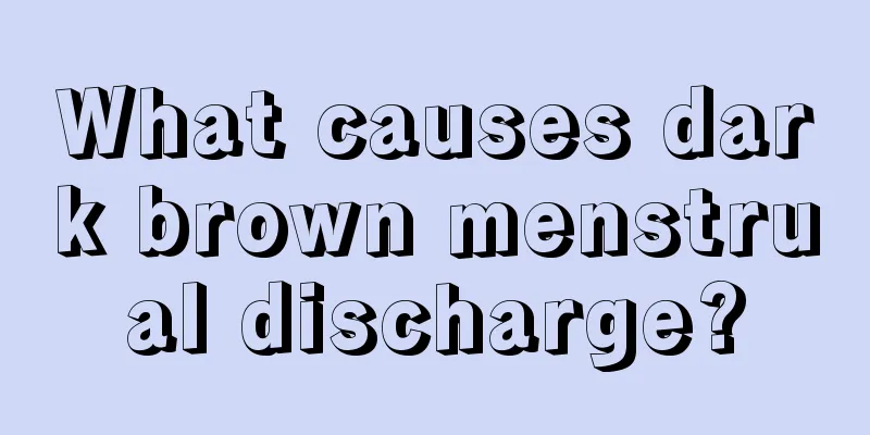 What causes dark brown menstrual discharge?