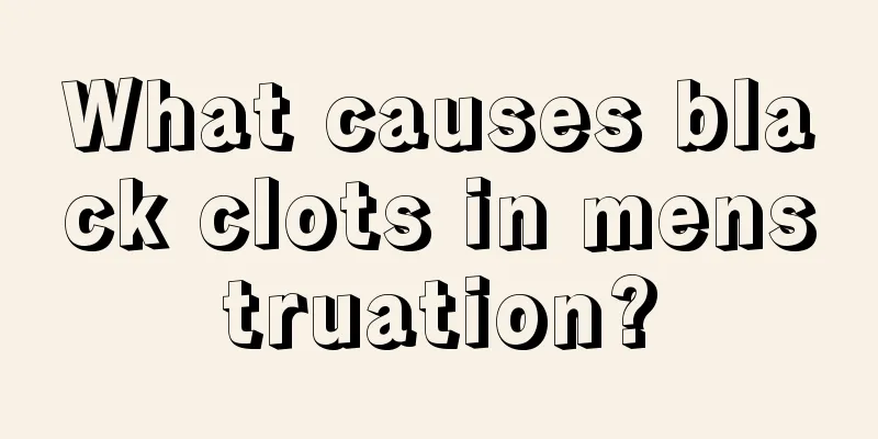 What causes black clots in menstruation?