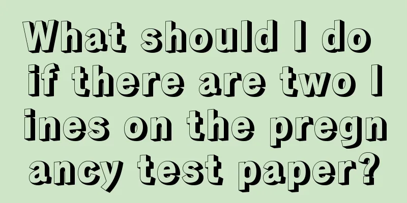 What should I do if there are two lines on the pregnancy test paper?