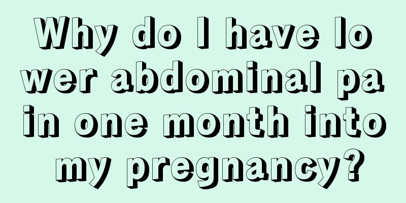 Why do I have lower abdominal pain one month into my pregnancy?