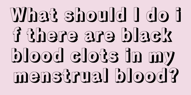 What should I do if there are black blood clots in my menstrual blood?