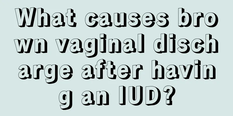 What causes brown vaginal discharge after having an IUD?