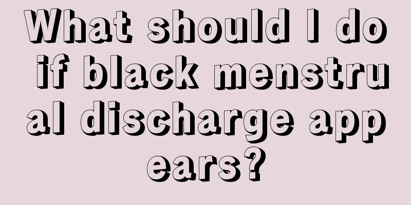 What should I do if black menstrual discharge appears?