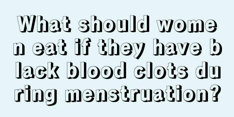 What should women eat if they have black blood clots during menstruation?