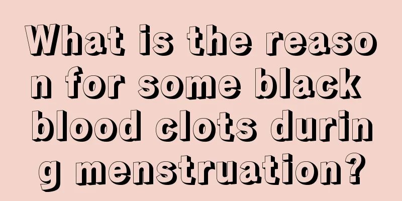 What is the reason for some black blood clots during menstruation?