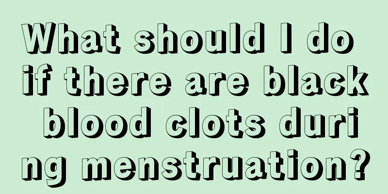 What should I do if there are black blood clots during menstruation?