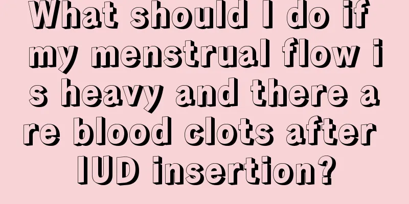 What should I do if my menstrual flow is heavy and there are blood clots after IUD insertion?