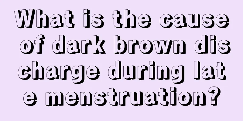 What is the cause of dark brown discharge during late menstruation?