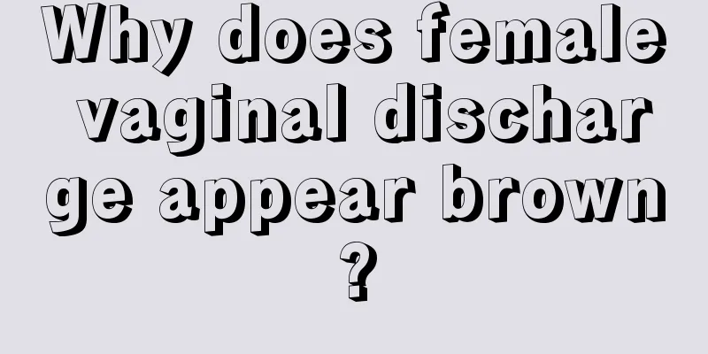 Why does female vaginal discharge appear brown?